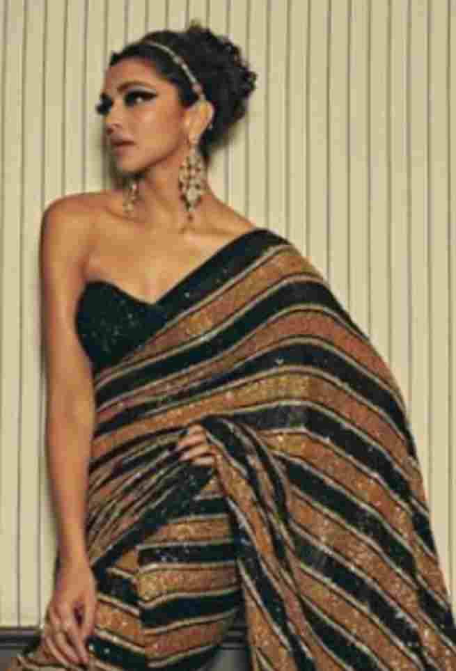 Buy Deepika Striped Black Georgette Saree
