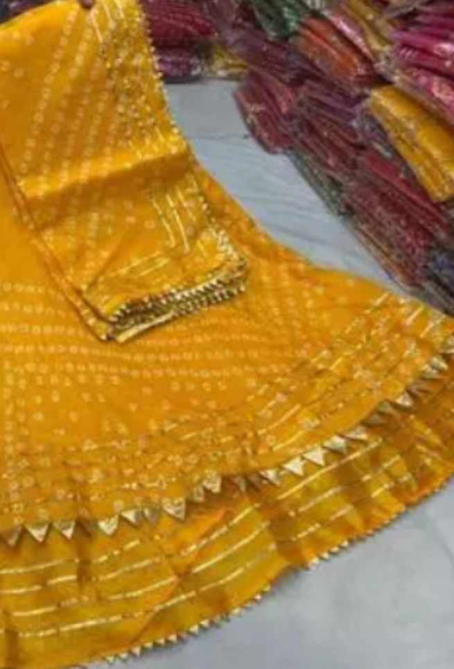 Buy Yellow Bandhani Lehenga Choli with Kota Doriya Gota Patti Border Online